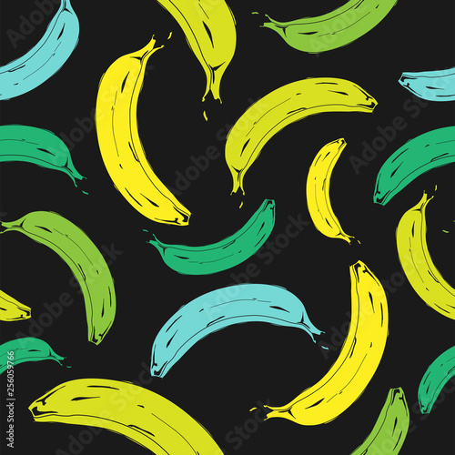 Seamless pop art banana color green and yellow pattern randomly distributed on black background. Vector Illustration.