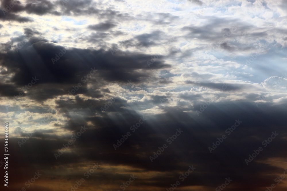 amazing vivid with sun rays partially cloudy sky for using in design as background.