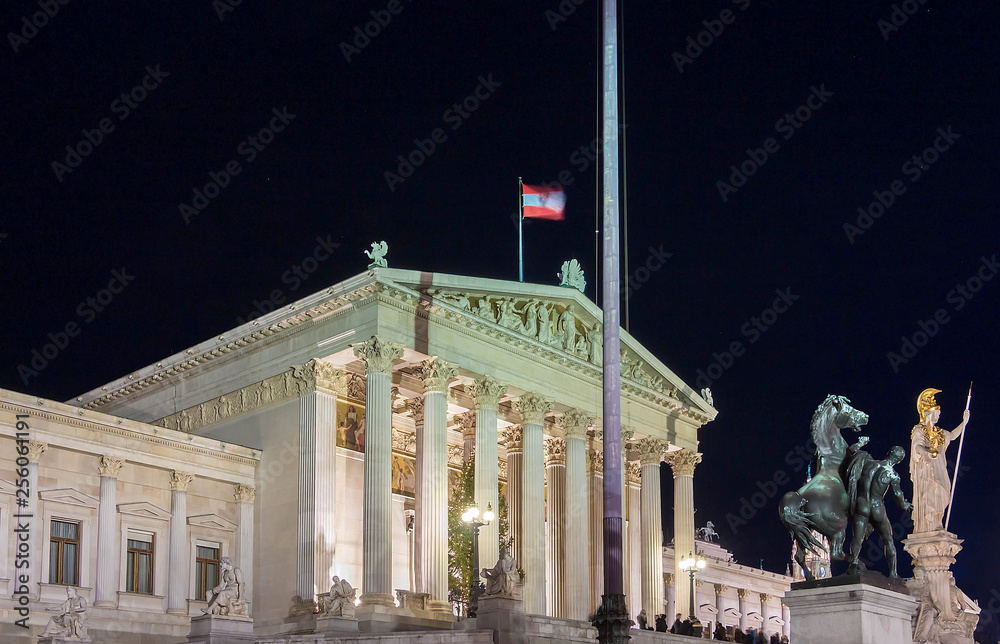 Naklejka premium The Austrian Parliament palace in Vienna at night, Austria.