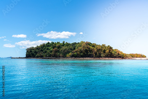 beautiful picture of an island in the ocean on a sunny day © evoks24