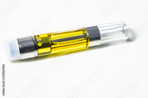 Cannabis distillate plus terpenes in vaporizor cartridge for smoking the cannabinoids extracted from marijuana plants for medicinal use. Isolated on white background