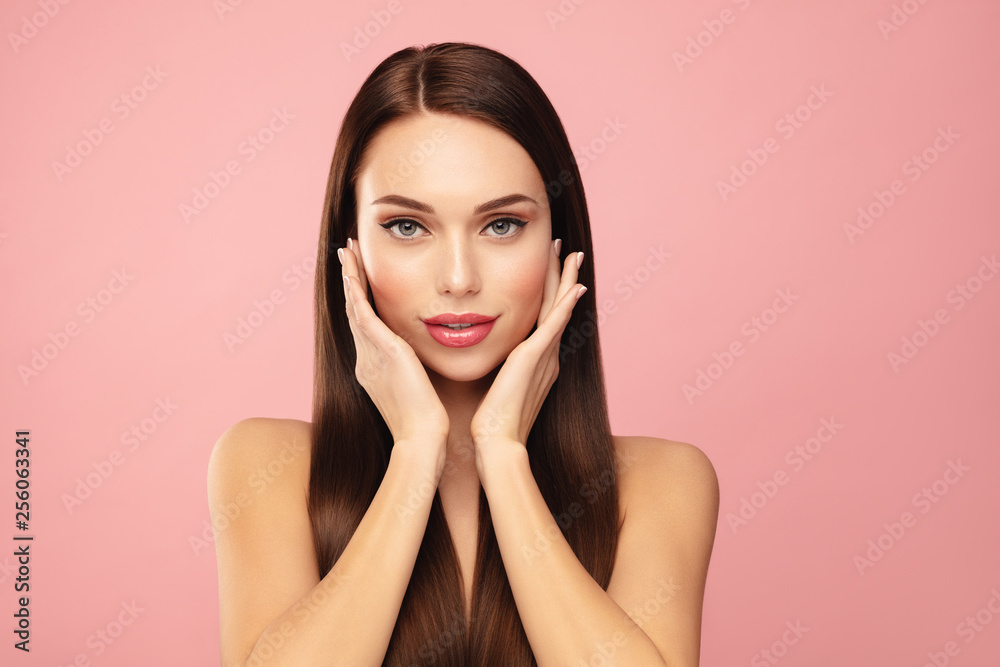 Fresh and beautiful.Brown hair model face portrait. Elegant attractive woman with pergect skin and natural make up against pink bacground. Beauty salin and cosmetics concept. Fresh and beautiful.Brown hair model face portrait. Elegant attractive woman with pergect skin and natural make up against pink bacground. Beauty salin and cosmetics concept.