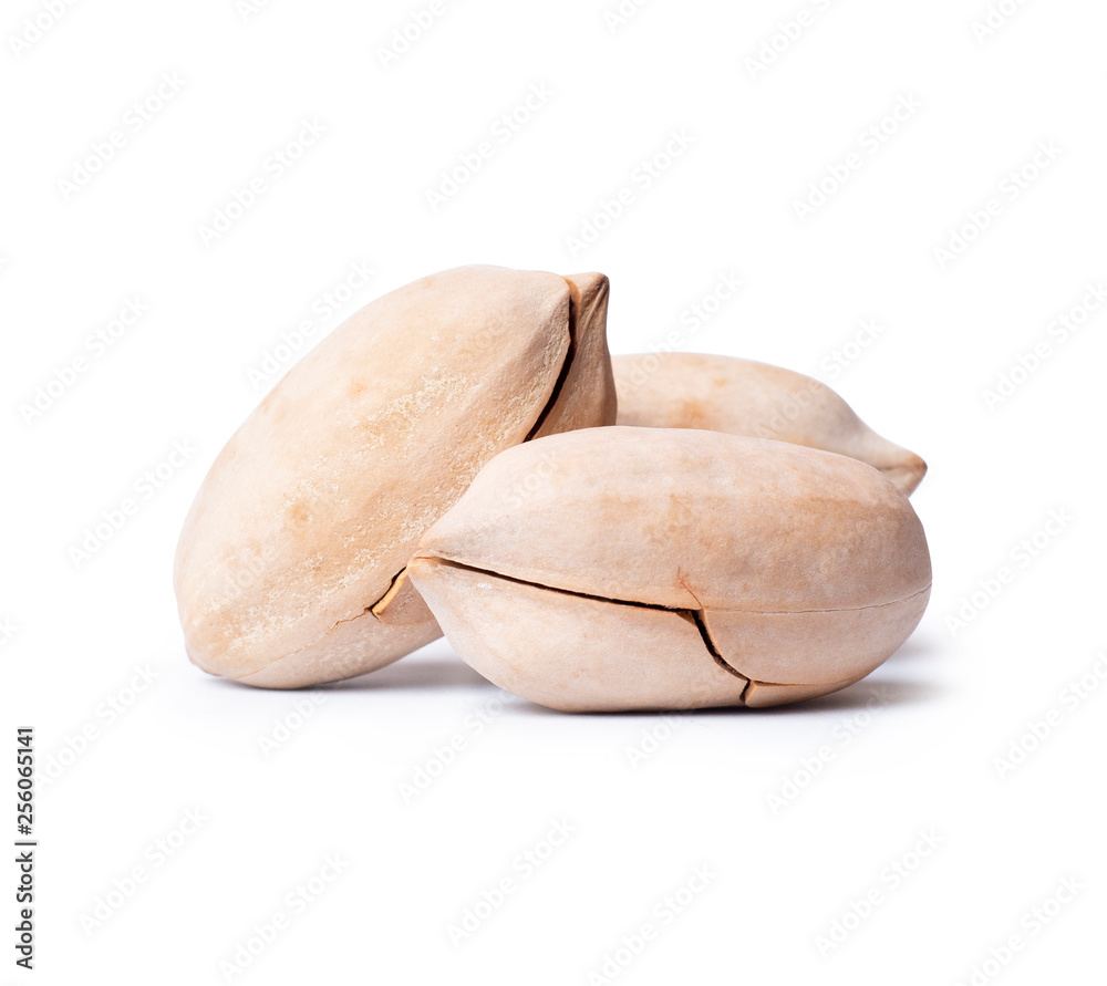 Pecan nuts closeup isolated on white background Pecan nuts closeup isolated on white background