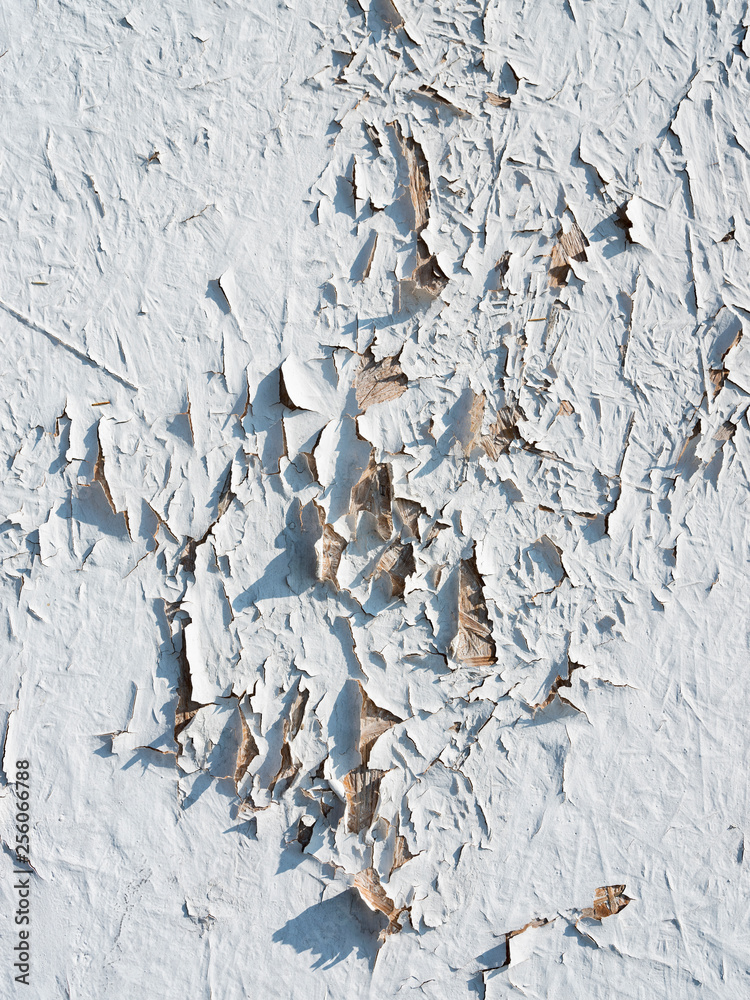 old wooden painted wall in cracks