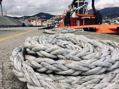 Hawser on quay of Genoa (Italy) harbor
