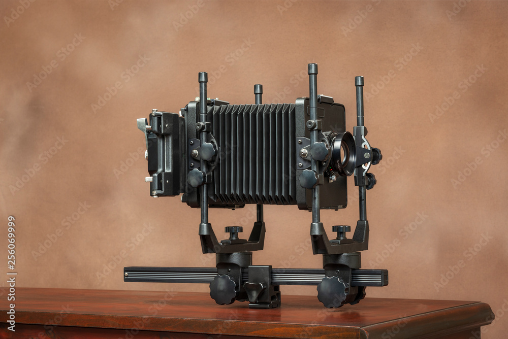 4x5 View Camera From Side On Brown With Copy Space 4x5 View Camera From Side On Brown With Copy Space