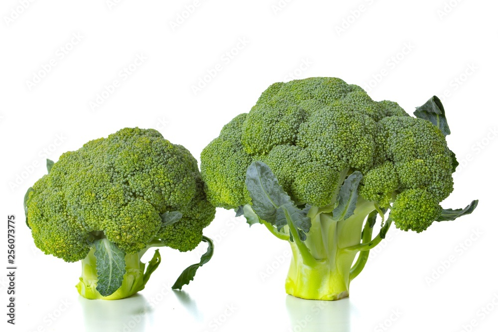 Green broccoli isolated on white background, vegetarian. Green broccoli isolated on white background, vegetarian.