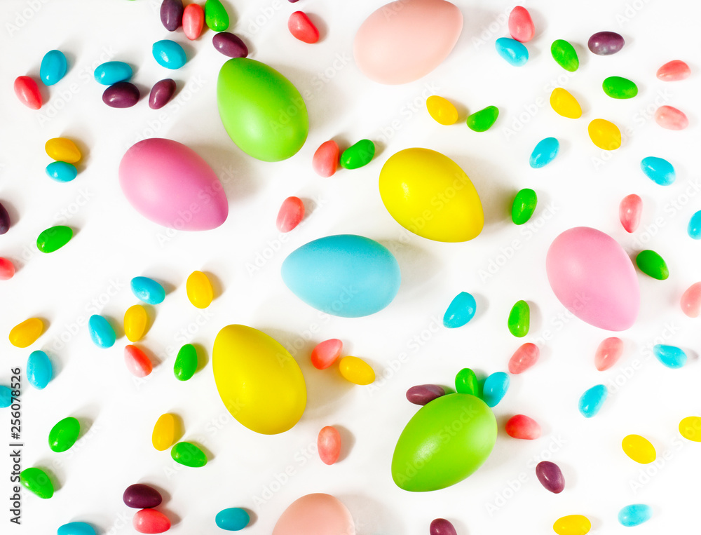 Easter eggs and candy background