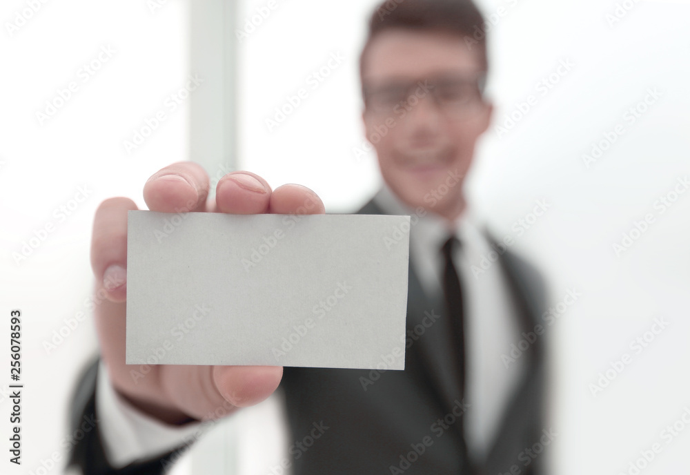 businessman showing a blank business card