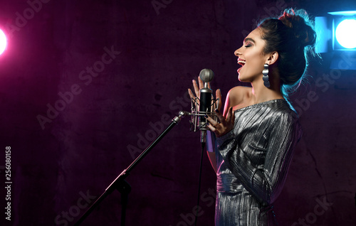 Photography Beautiful singing girl curly afro hair singer sing with microphone karaoke song