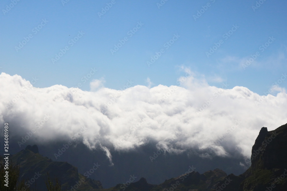 Obraz premium Clouds over mountains