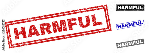 Grunge HARMFUL rectangle stamp seals isolated on a white background. Rectangular seals with distress texture in red, blue, black and gray colors.