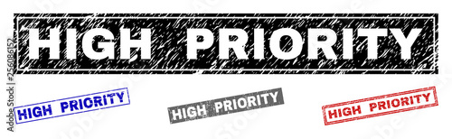 Grunge HIGH PRIORITY rectangle stamp seals isolated on a white background. Rectangular seals with grunge texture in red, blue, black and gray colors.
