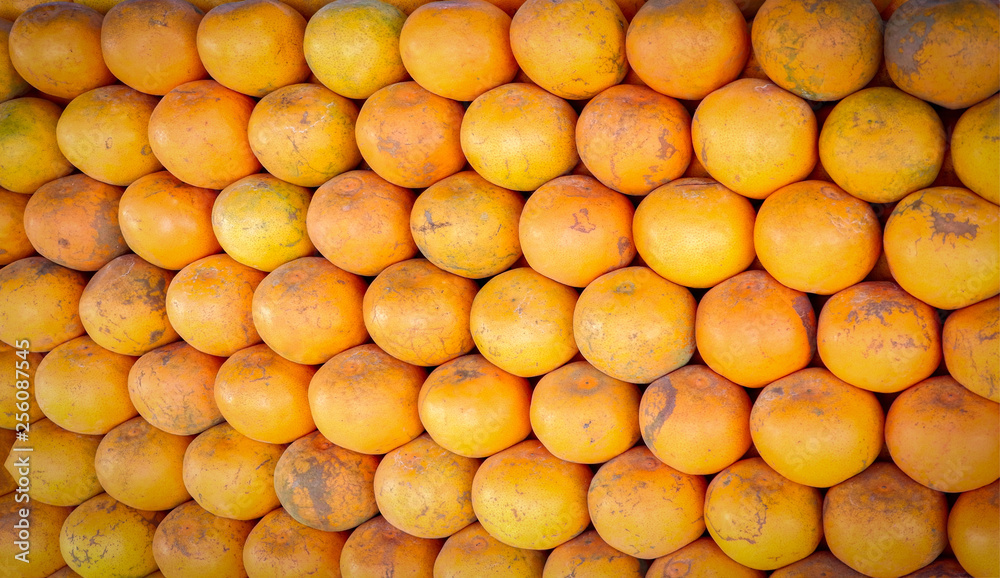 Fresh orange fruit texture background for sale in the market