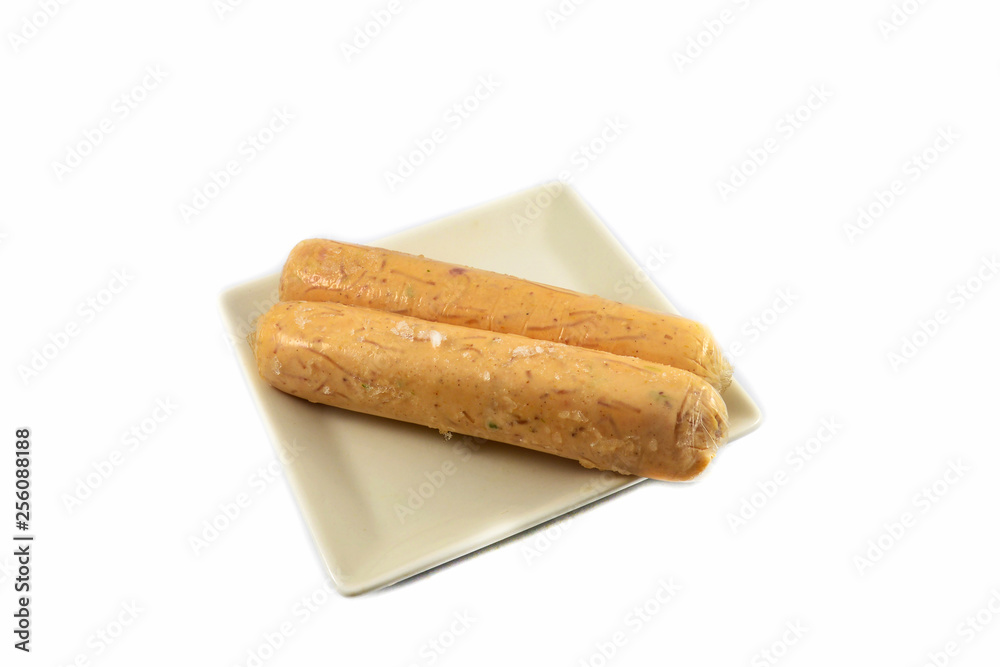 Sausage long with pork and vermicelli on white plate isolated on white background Sausage long with pork and vermicelli on white plate isolated on white background