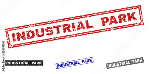 Grunge INDUSTRIAL PARK rectangle stamp seals isolated on a white background. Rectangular seals with grunge texture in red, blue, black and grey colors.
