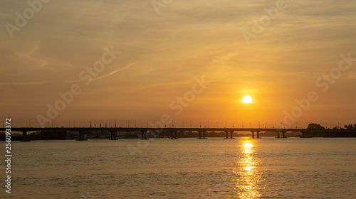 sunset over a bridge © arfa_adam
