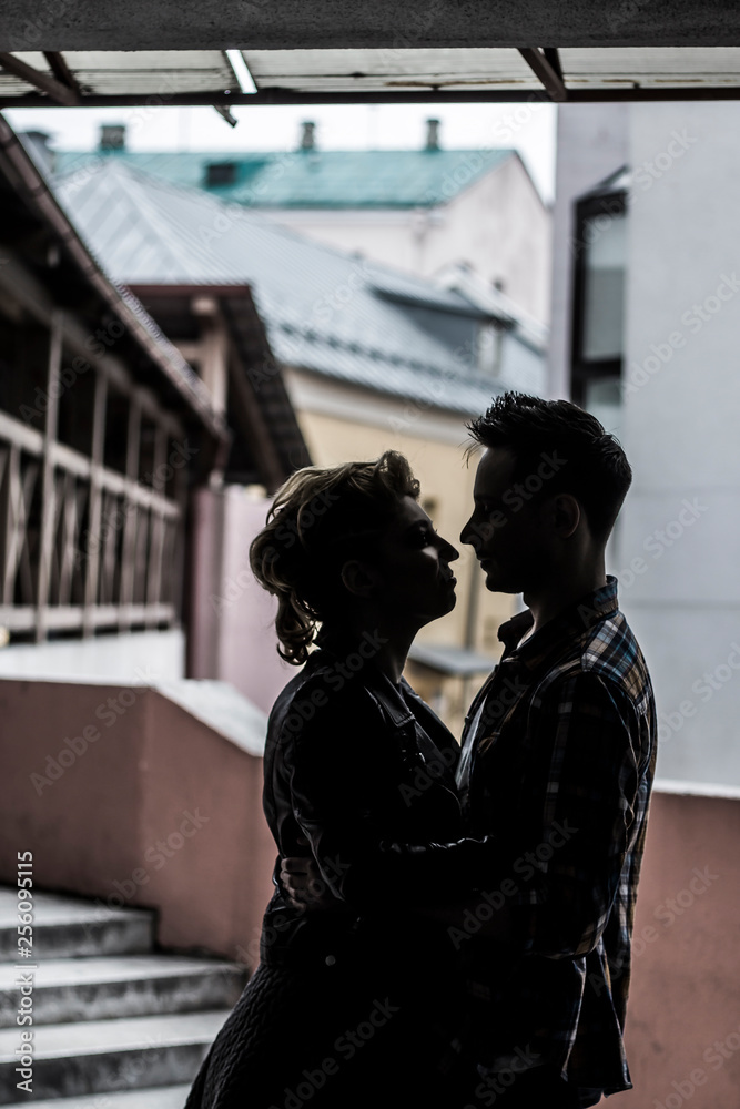 lovers hug each other on the streets of a big city lovers hug each other on the streets of a big city