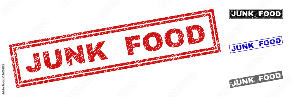 Grunge JUNK FOOD rectangle stamp seals isolated on a white background. Rectangular seals with grunge texture in red, blue, black and grey colors. Grunge JUNK FOOD rectangle stamp seals isolated on a white background. Rectangular seals with grunge texture in red, blue, black and grey colors.