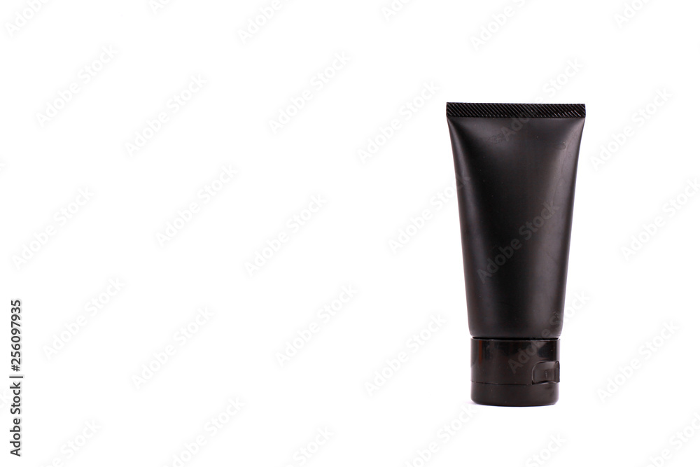 Black cosmetic containers on white background Black cosmetic containers on white background