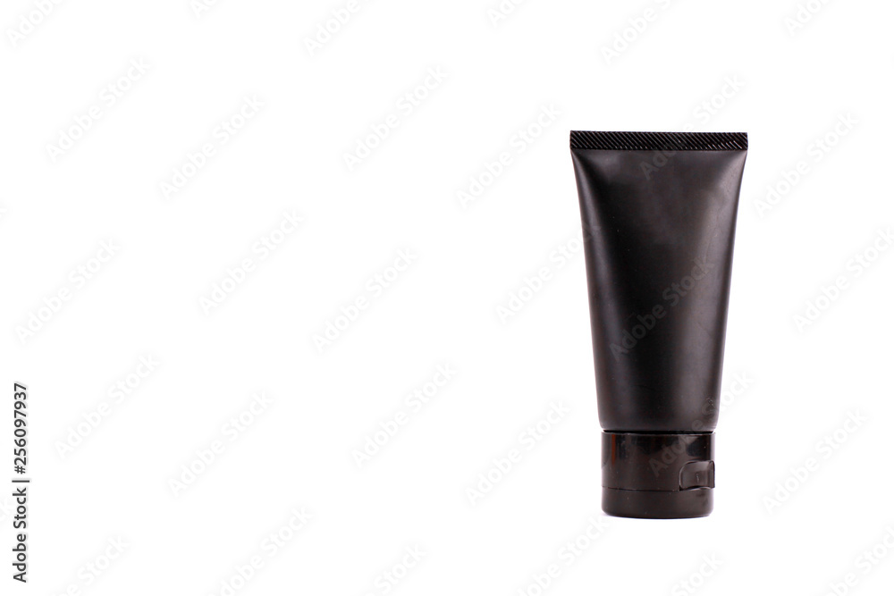 Black cosmetic containers on white background Black cosmetic containers on white background