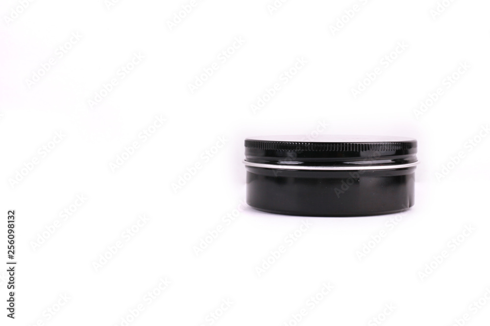 Black cosmetic containers on white background Black cosmetic containers on white background