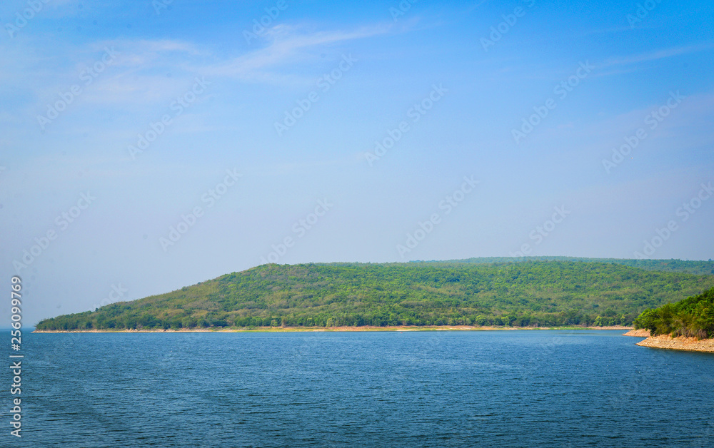 Green island view sea mountain background / Lagoon blue water