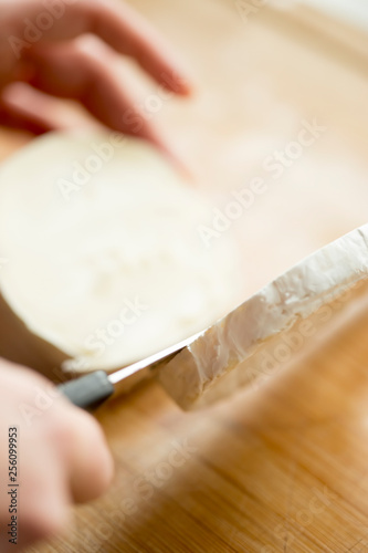 Cut brie cheese 