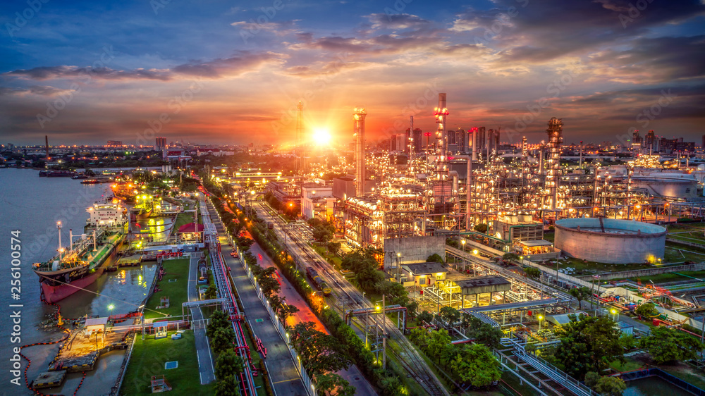 Fototapeta premium Oil and gas industry - refinery factory - petrochemical plant at sunrise
