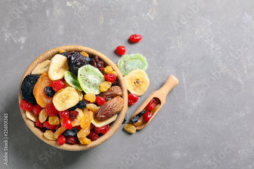 Fototapeta Naklejka Na Ścianę i Meble -  Flat lay composition with different dried fruits on grey background, space for text. Healthy lifestyle