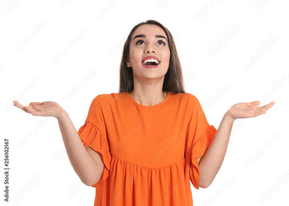 Happy young woman in casual clothes posing on white background Happy young woman in casual clothes posing on white background