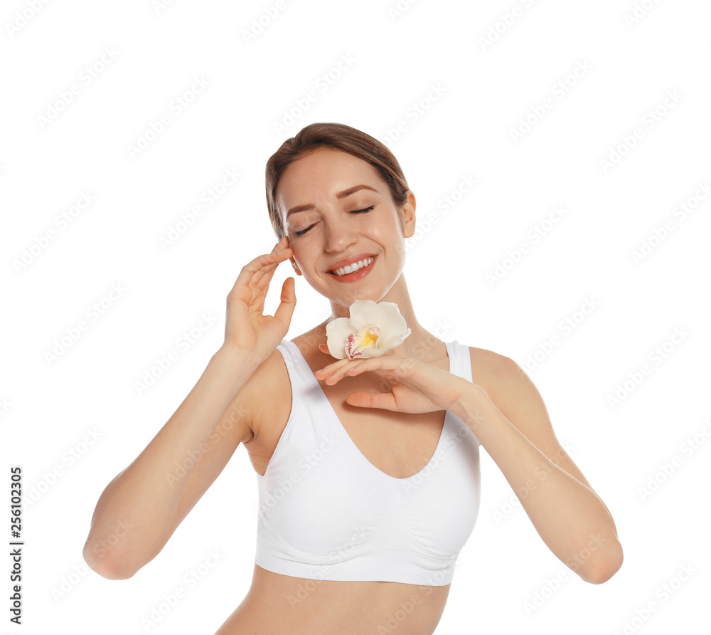 Portrait of young woman with perfect smooth skin and flower on white background. Beauty and body care Portrait of young woman with perfect smooth skin and flower on white background. Beauty and body care