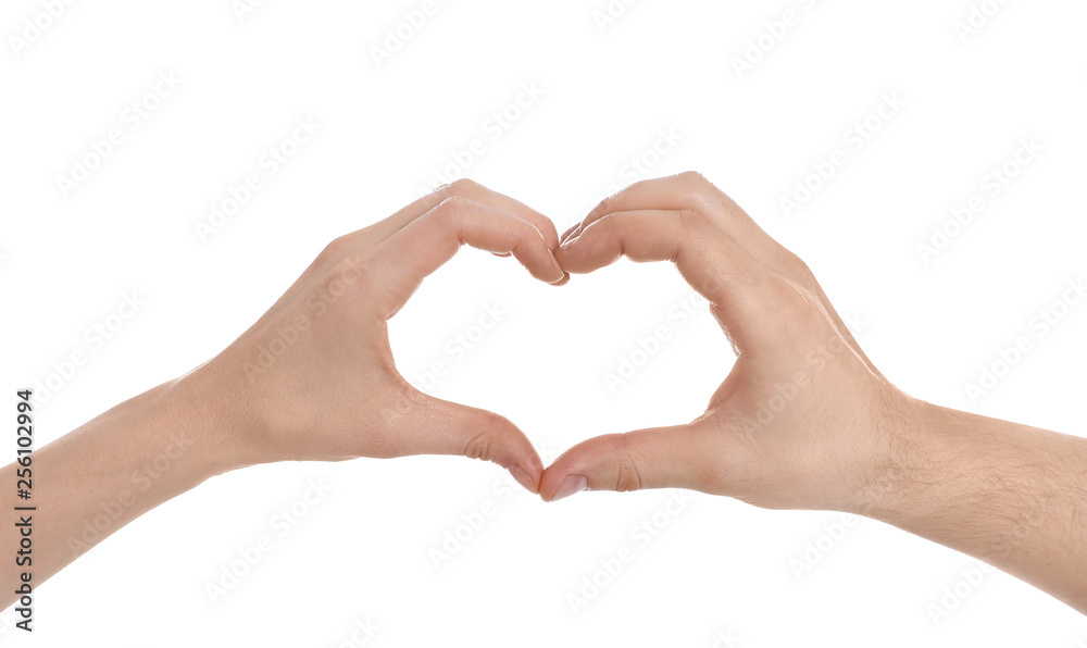 Man and woman making heart with their hands on white background, closeup Man and woman making heart with their hands on white background, closeup