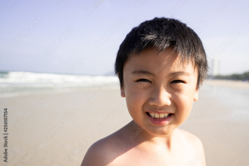 Little boy on the beach for summer holiday Little boy on the beach for summer holiday