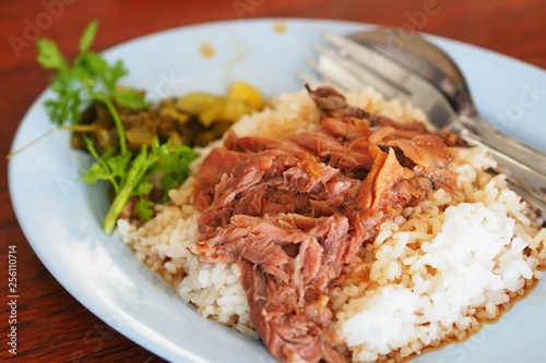 Thai Pork Leg Stew or Kao Ka Moo on Blue dish
