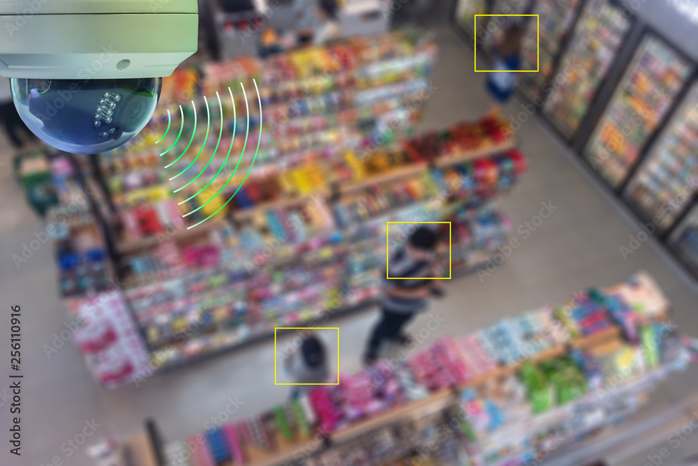 A Dome CCTV  infrared camera  technology 4.0 for look security area of people at convenience shop  show signage with checking and counting people in yellow boxed security area