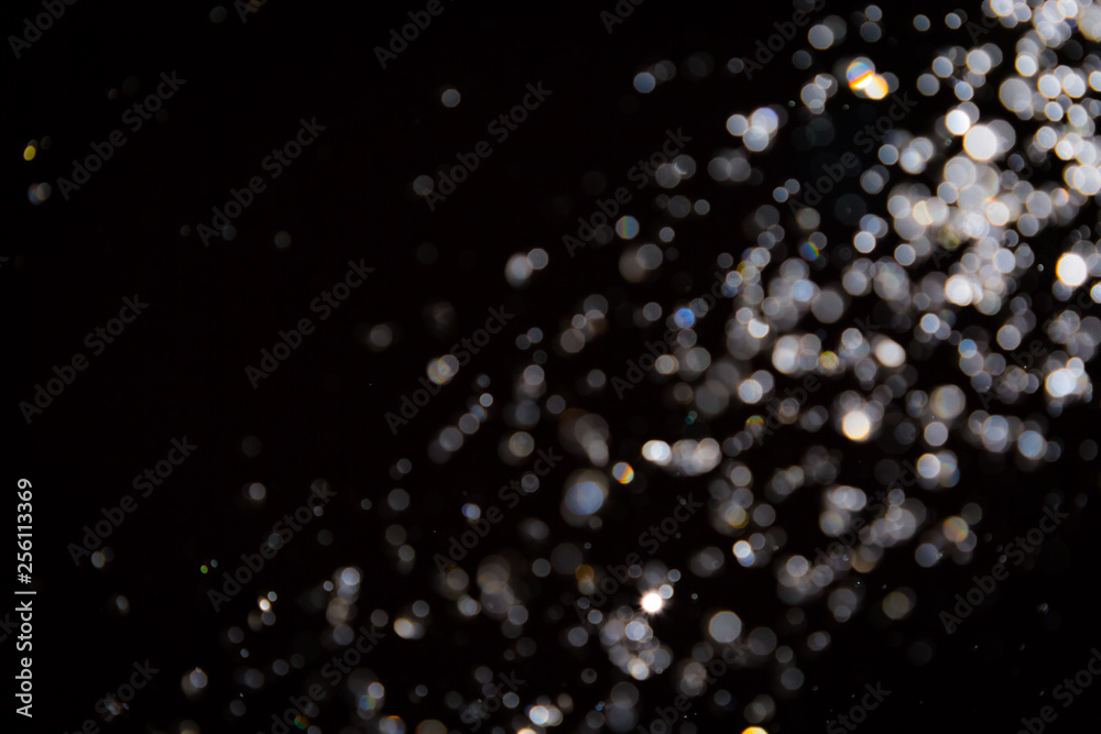 Fototapeta premium Streszczenie rozmycie bokeh tekstury na czarno