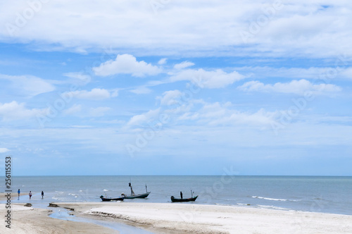 Hua Hin beach with local fishing boats, Thailand photo