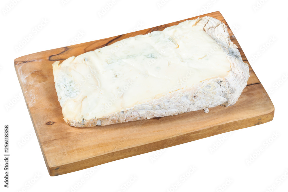 Gorgonzola soft blue cheese on board isolated