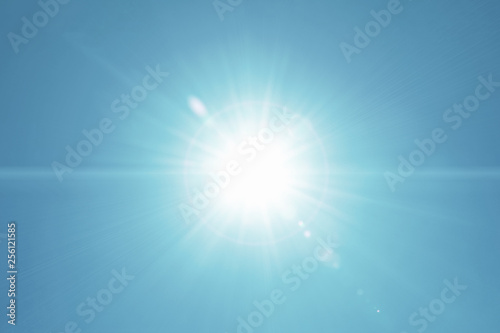 Sunlight Motion Lens flare on Clear on Real blue sky background