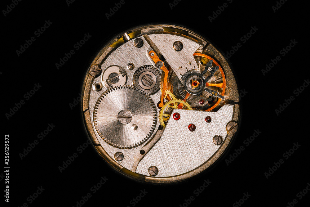 Clockwork macro isolated over the black background Clockwork macro isolated over the black background