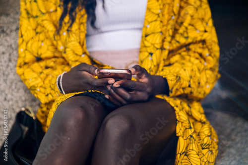 Woman holding her phone