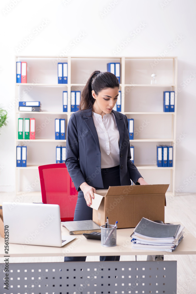 Young female employee being fired from her work Young female employee being fired from her work