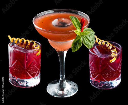 Set of special cocktails with grapefruit and berries. On dark background