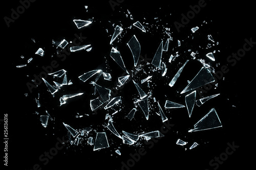 broken glass with sharp pieces over black photo