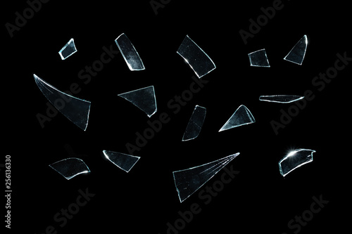 broken glass with sharp pieces over black