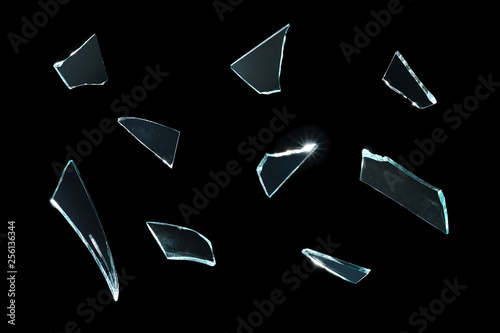 broken glass with sharp pieces over black