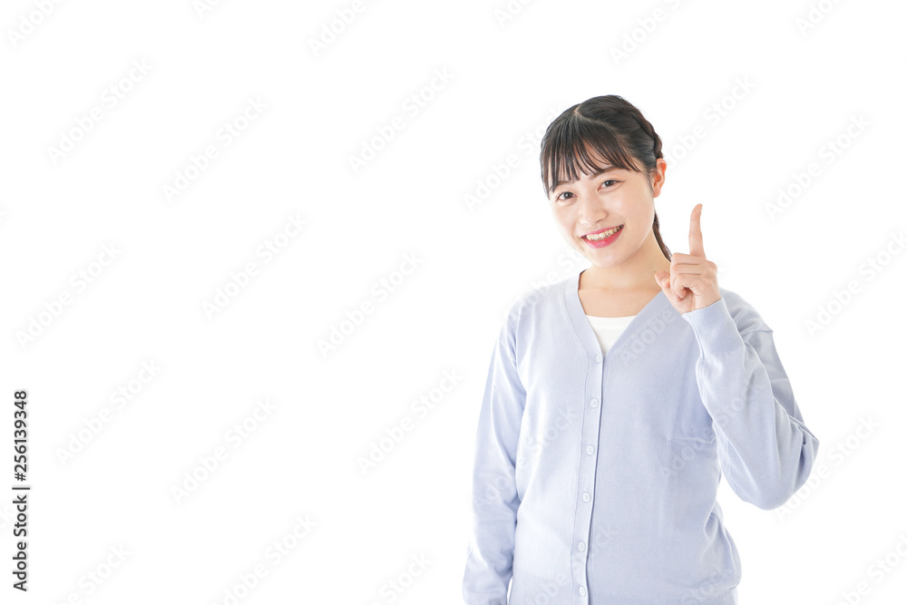 指を指す若い女性 指を指す若い女性