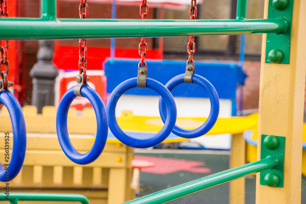 Blue rings on a children's playground in the street Blue rings on a children's playground in the street