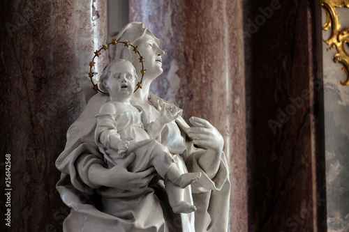 Saint Anne statue on the main altar in Amorbach Benedictine monastery church in Lower Franconia, Bavaria, Germany  photo
